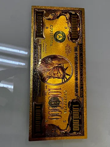 Gold-plated novelty $10,000,000 decorative bill with Statue of Liberty design
