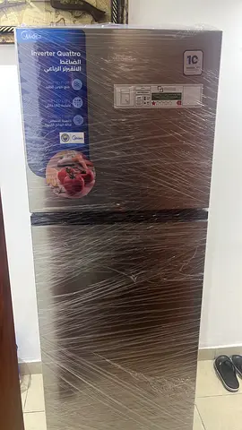 Midea Brand, Mint Condition double-door refrigerator, stainless steel finish - good condition