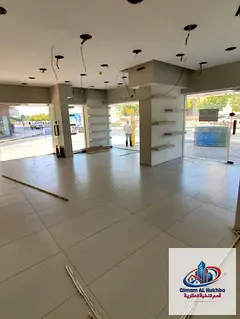 Large 550 sq ft Commercial Shop for Annual Rent on Sharjah Corniche, Prime Corner Location on Two Ma