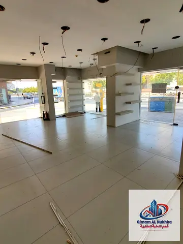 Large 550 sq ft Commercial Shop for Annual Rent on Sharjah Corniche, Prime Corner Location on Two Main Roads at an Excellent Price.