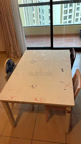 Pottery Barn kids activity table with three chairs - sturdy, some marker marks