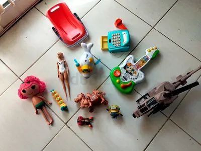 Mixed lot of kids toys: dolls, vehicles, musical toy, figures (fair condition)