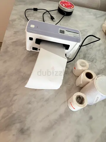 Thermal label printer with extra rolls — used, working