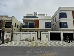 For sale in Al-Aliya area | Modern villa with 7 bedrooms, majlis, living room, and roof terrace, pri