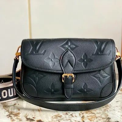 Louis vuitton Daine crafted from embossed
