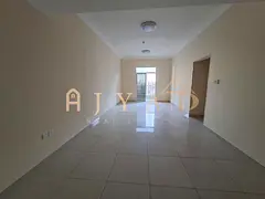 Annual rent: 2BR Al Jurf 3, 2 baths, central AC, balcony, built-in wardrobes, flexible payments, pre