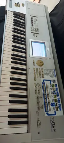 Korg Triton Studio is a professional music workstation synthesizer in excellent condition