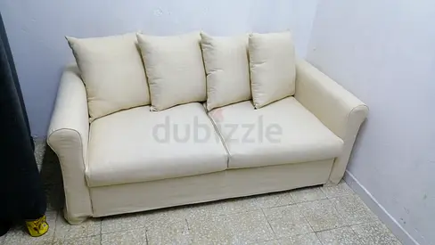 Cream 2-seater Sofa bed with Cushions - Compact and Comfortable
