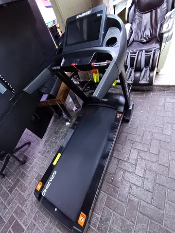 Sparnod Fitness STH-6010 is a motorized home treadmill featuring a 3 HP continuous (6 HP peak) DC mo
