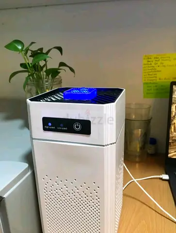 Compact desktop air purifier — white, one week used