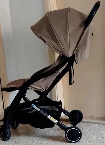 Juniors brand light weight cabin approved stroller