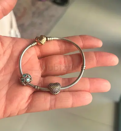 Pandora Sterling silver charm bracelet with heart and crystal charms