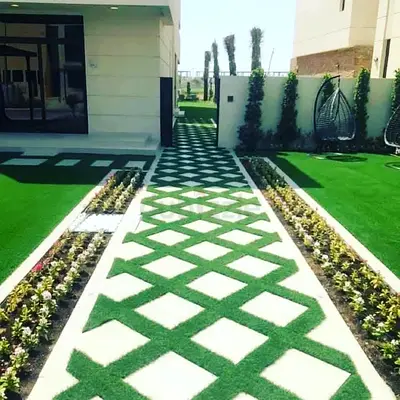 Modern outdoor pathway with artificial grass inlay — ready-installed