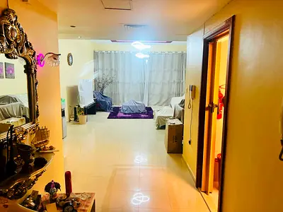 Two bedrooms and a living room for sale in Horizon Towers, excellent location near all services, easy access to Dubai.