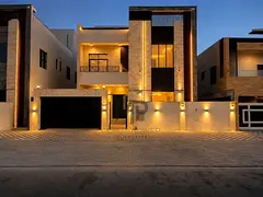 Strategic Location in Al Alia, Ajman | 5 Master Bedrooms | Two Floors + Roof | Elevator | Includes A