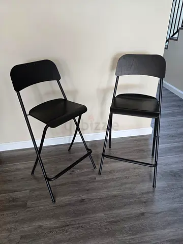 Set of 2 black metal folding bar stools with backrest