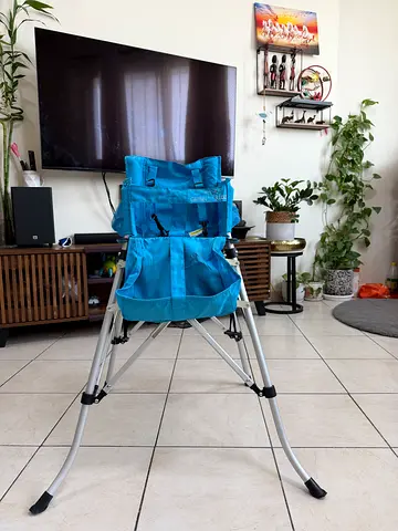 Foldable portable baby high chair / booster seat. It is washable & can be use like beach chair too.