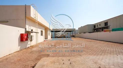 Yard with Shed in Al Sajaa | Strategic Prime Location | Interlock Flooring | Main Road | 10,000 Sq Ft | Office Space | Suitable for Various Activities