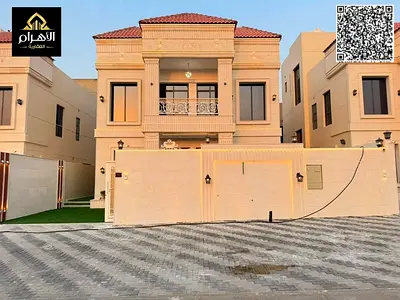 Ready to move in with electricity, water, and air conditioning | Own a luxury villa in Al Helio 1, Ajman | 4 master bedrooms | A great deal at a compe