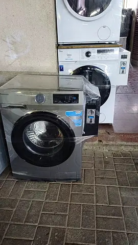 Front Load coin Washing Machine - 7kg (Like New, Stainless Finish)