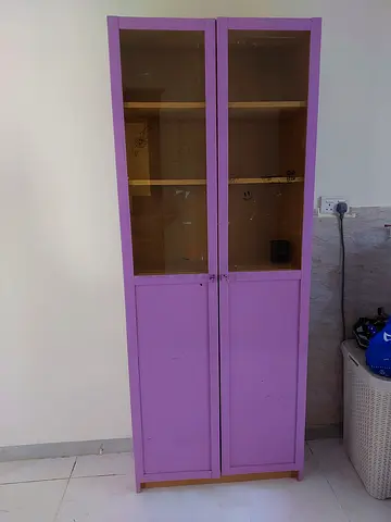 Tall purple wooden bookcase with glass doors, 6 shelves