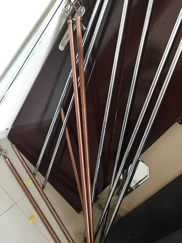 Set of metal curtain rods and finials — good condition All