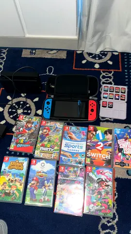Nintendo Switch console with 12+ games, dock, case and cartridges