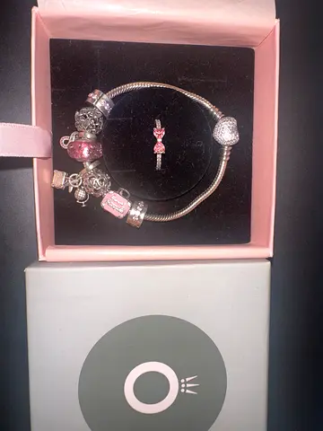 Pandora charm bracelet with charms and ring