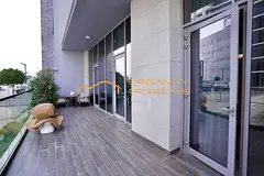 Rare District One 2BR Ground Floor Apartment | Upgraded | Huge Balcony | Vacant