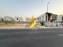 Residential land for sale in Al Houshi, Sharjah, near Al Murooj roundabout and opposite the palaces.