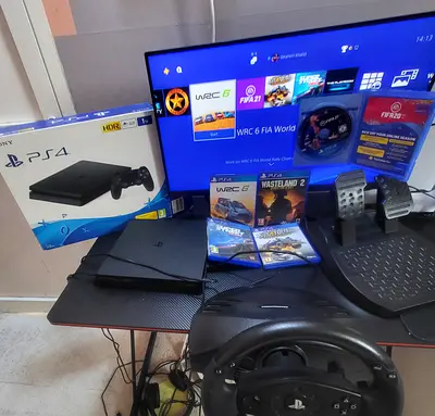 PS4 1TB bundle+5 GAMES+WHEEL&PADDLES READY FOR RACING