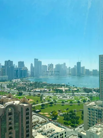 Spacious 3-Bedroom Apartment in Al Majaz 2 with Balcony, Large Storage Room, High Floor, Excellent View, Free Parking and Maintenance