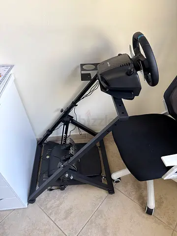 Logitech racing wheel with pedal set and foldable stand - used