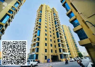 Large apartment for rent in Al Khor Towers: 3 bedrooms, a majlis, and a maid's room.