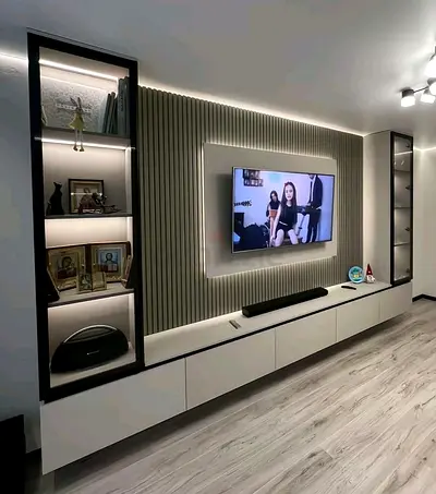 Modern wall-mounted entertainment center with illuminated display cabinets