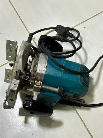 Used woodworking router — compact electric hand router