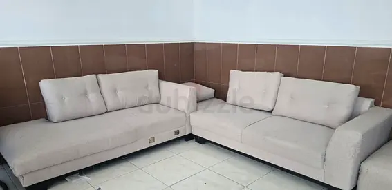 L-shaped beige fabric sofa set — 2-piece corner sofas, good condition