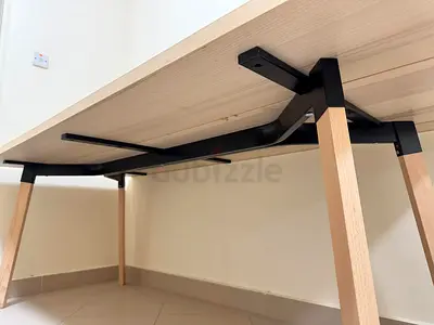 IKEA-style wooden dining table - light wood