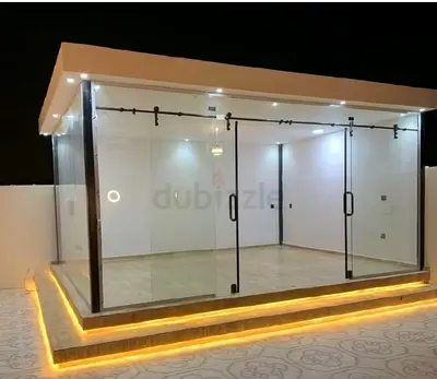 Modern Glass-Walled Outdoor Room / Garden Studio with Sliding Doors