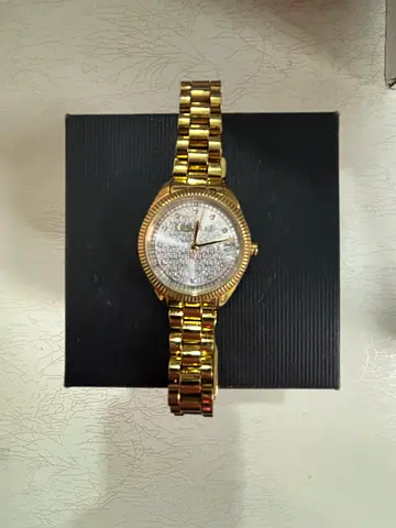 Gold Tone Watch with Rhinestone Dial