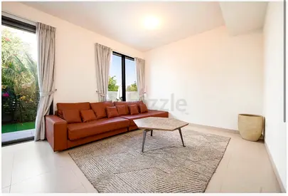 Brand new leather L-shaped sectional sofa (6 cushions) + matching wood coffee table with metal legs