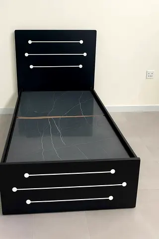 Single wooden bed for sale