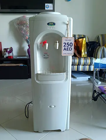 Used White Water Dispenser Cooler - Good Working Condition