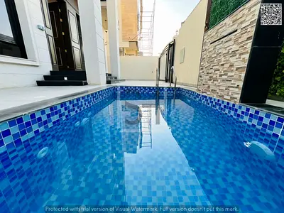 Villa for sale opposite a garden, including registration fees, electricity, water and air condition