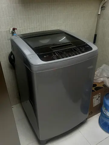 LG Top Load Washing Machine - Silver, Almost New Condition. (Price negotiable for serious buyers)