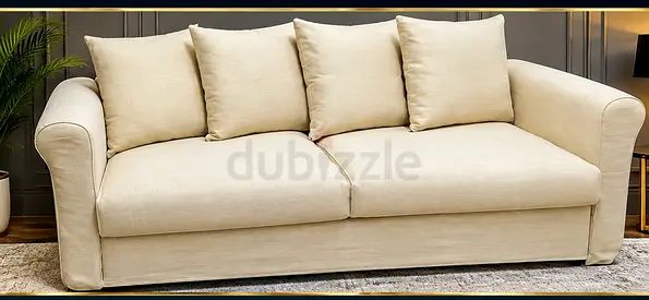 Beige 2 Seater Sofa bed with Cushions - Good Condition