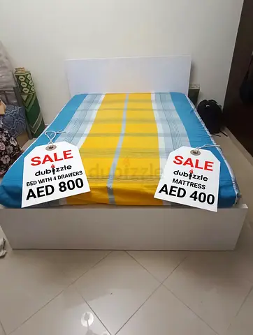 White platform queen size with 4 drawers + mattress in clean condition as was with protective cover