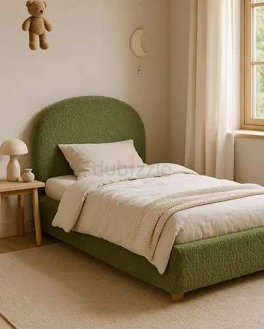 Single green upholstered bed frame with curved headboard -