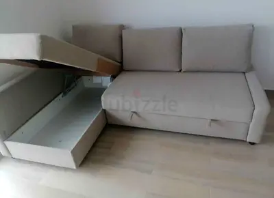 Beige L-Shaped Sofa Bed with Integrated Storage