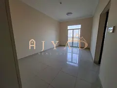 Annual rent: 1BR Al Jurf 3, master, built-in wardrobes, central AC, sunny balcony, flexible payments